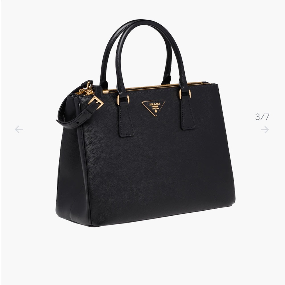The Prada Galleria bag made of iconic Saffiano
leather in black.